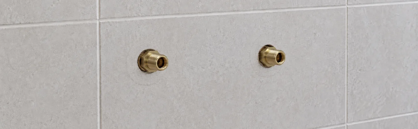 Conceptual illustration of breech adapters fitted smooth end first into recessed tap bodies